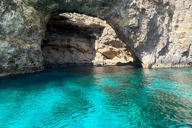Blue Lagoon Ferry and Caves Tour - Getting to the blue umbrella in Mgarr Gozo (and keeping it easy)