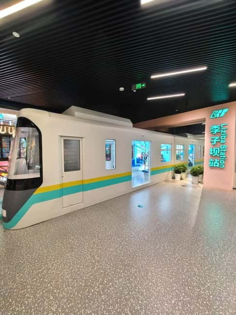 Chongqing: Trendy Spots, Cableway & Ferry Private Tour - Changjiahui Danzishi Laojie St: interactive exhibits about Chongqing’s transformation