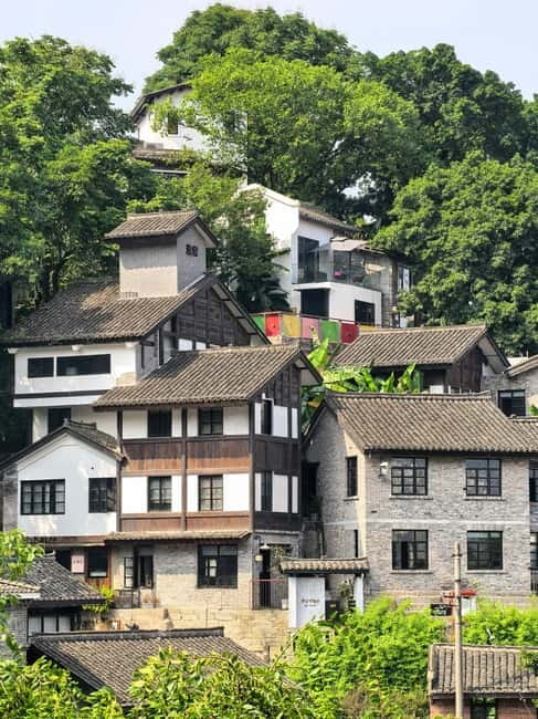 Chongqing: Trendy Spots, Cableway & Ferry Private Tour - Daijia Lane and Kuixinglou: cliffside steps, iron rails, and laundry over the drop