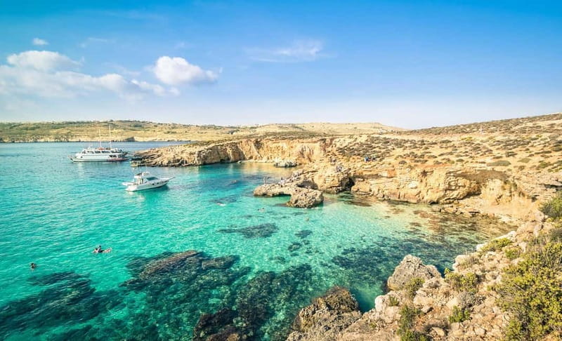 Coastal Ferry Cruise to The Blue Lagoon (Comino Island) - On the water: catamaran comfort plus a real-wave reality
