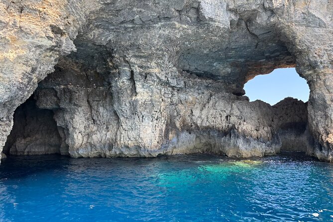 Comino Islands Private Boat Tour Ebsons Ferry - Santa Maria Caves: a quick coast-hugging moment