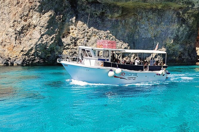 Comino Islands Private Boat Tour Ebsons Ferry - Elephant-trunk rock and the 17th-century watchtower view