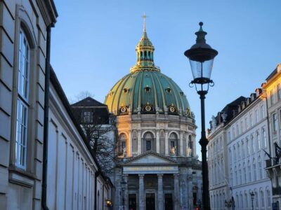 Copenhagen Combo: Walking Tour, Harbor Ferry & Royal Guards - Start under the Central Station clock at Hovedbanegården