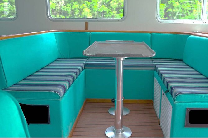 Ferry Transfer from Resorts in St. Lucia to Hewanorra Airport - On Board for 90 Minutes: Drinks, Snacks, and the Pitons Photo Line