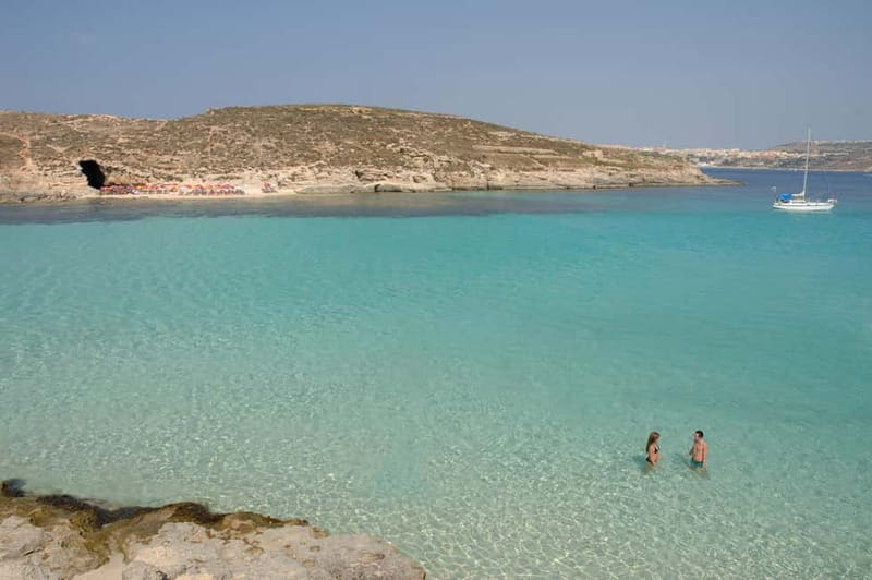 From Sliema or Bugibba: Comino Blue Lagoon Round Trip Ferry - Your Time in the Blue Lagoon: Independent, Scenic, and Sometimes Crowded