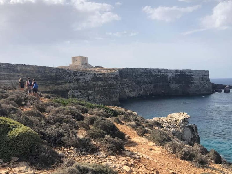 From Sliema or Bugibba: Comino Blue Lagoon Round Trip Ferry - Caves Tickets and the Pineapple Cocktail Token