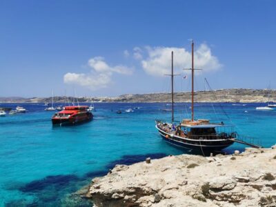 From Sliema or Bugibba: Two Islands Ferry to Comino and Gozo - Catamaran comfort: air-conditioning, Wi‑Fi, and real restrooms