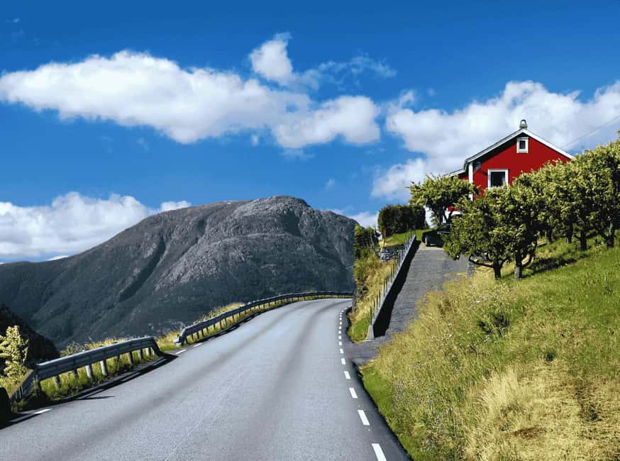 Guided tour: Hardangerfjord, Waterfalls and Ferry crossing - Utne village stop: wooden charm and a 300-year-old hotel