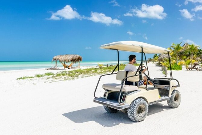 Holbox Island Tour Golf Cart Ferry with Lunch and Transportation - Key points at a glance