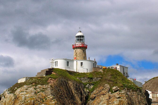 Howth Cliffs and Ireland's Eye Ferry Boat Tour - Exiting the harbour: Howth Lighthouse views on your way out