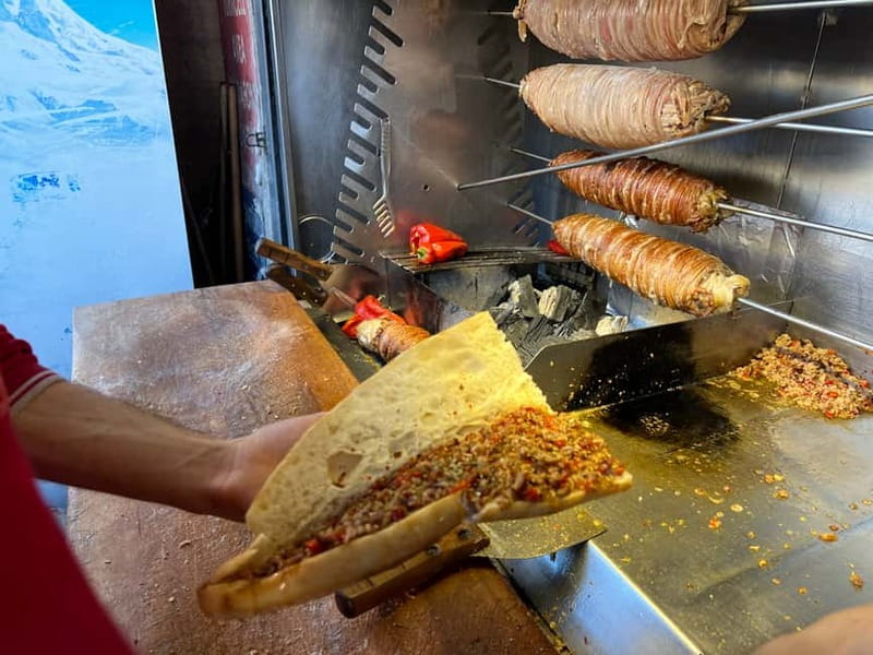 Istanbul: Guided Food Tour with Ferry Ride and Tastings - Stop-by-stop: from dairy and simit to menemen and cheese