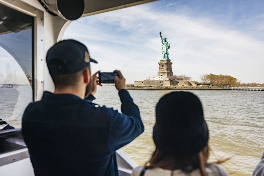 NYC: Wall Street Tour with 9/11 Memorial and Statue Ferry - Optional Ellis Island add-on: flexibility without extra pressure