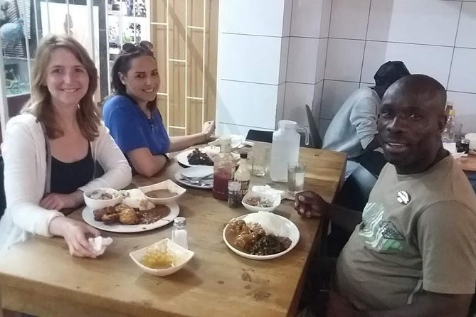 Robben Island Nelson Mandela's Prison Museum + Township Tour incl Ferry Tickets - Langa Township: Cultural Centre, Arts and Crafts Market, and Community Life