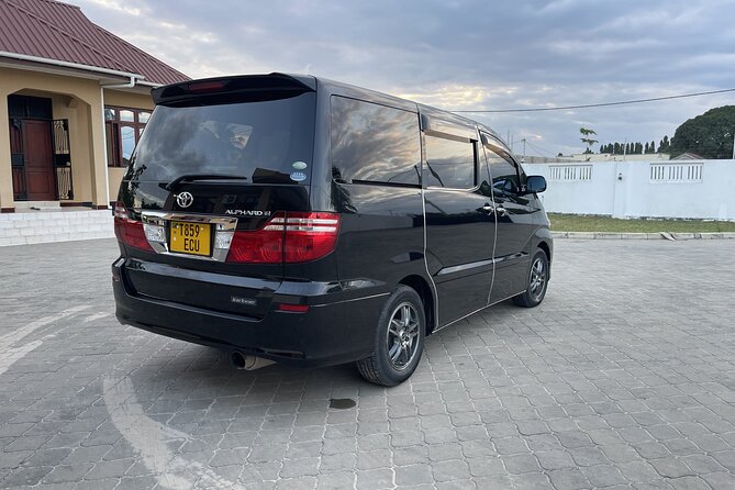 Transport Dar es Salaam Airport Port, Ferry or Train to Hotel - A clean Toyota Alphard beats the chaos of arrival