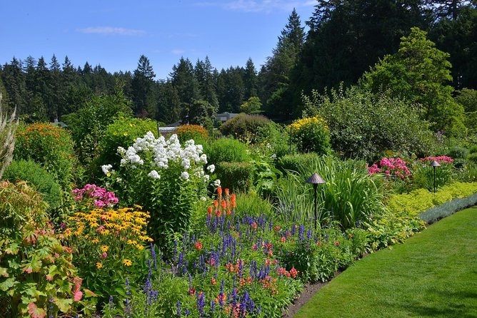Victoria & Butchart Gardens Tour with Gulf Islands Cruise Ferry - Victoria Downtown: Waterfront Walks and Empress Hotel Photos